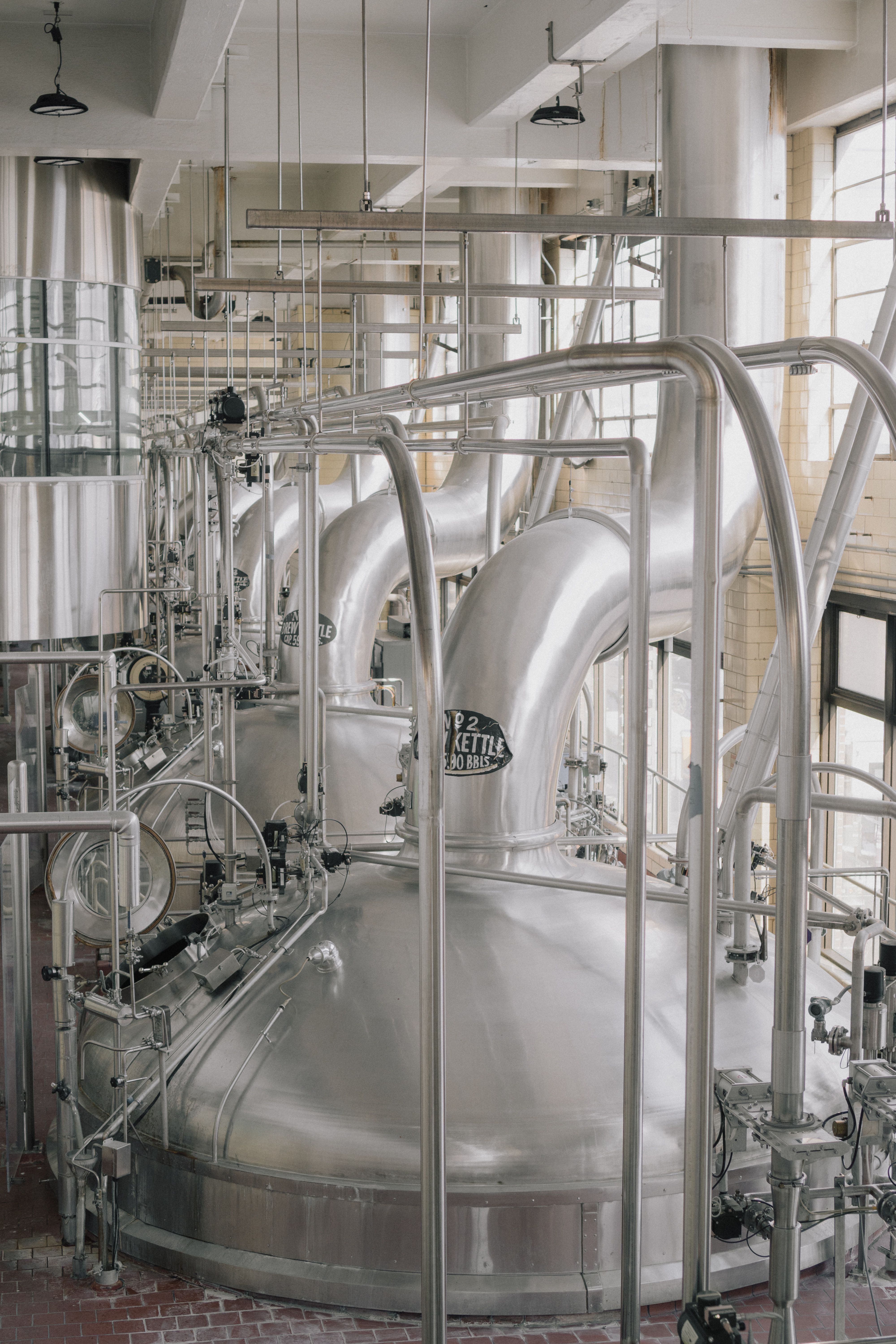 Industrial-sized brewing kegs at Miller